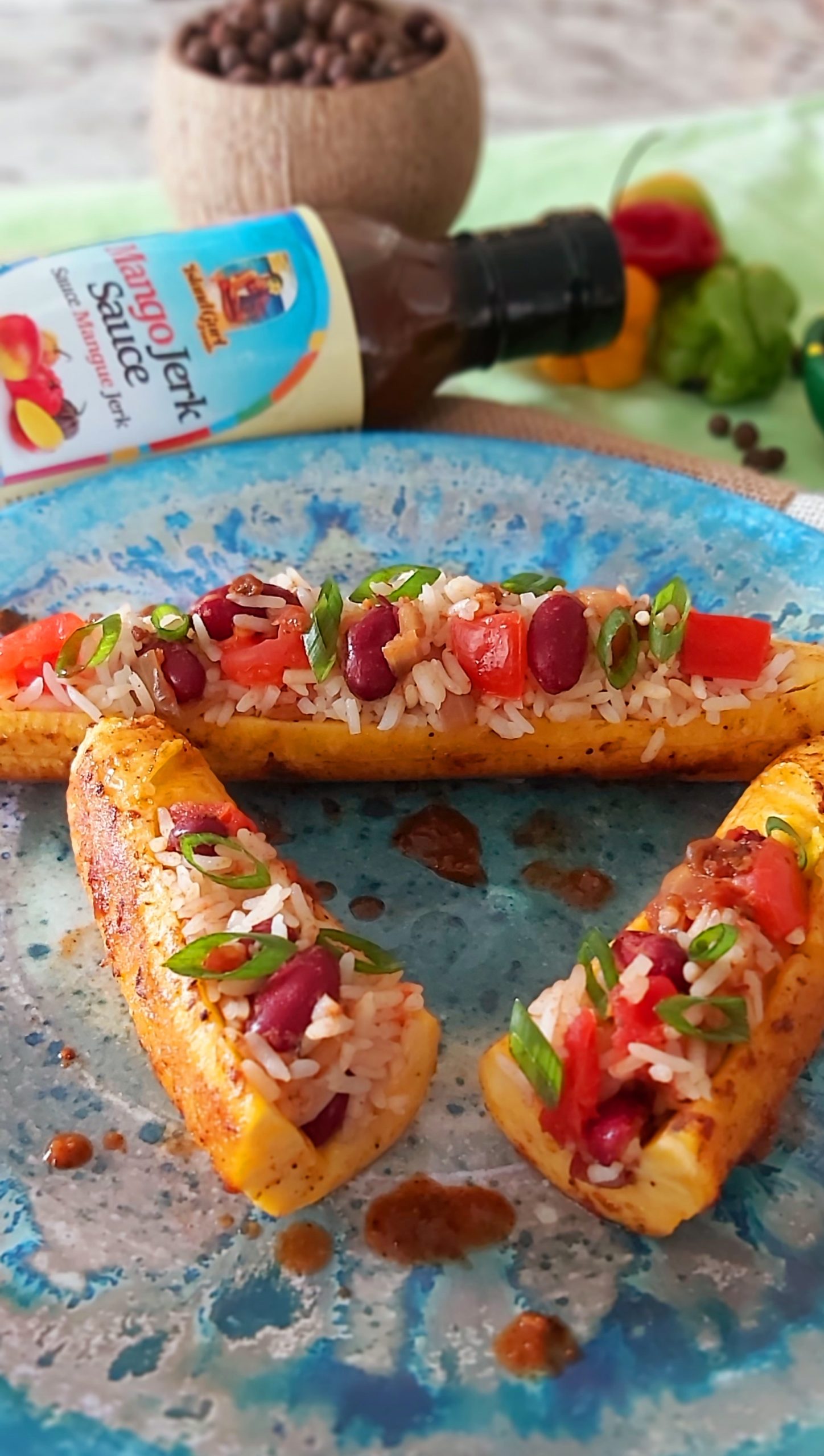 Mango-Jerk Plantain Boats
With Red Beans & Coconut Rice